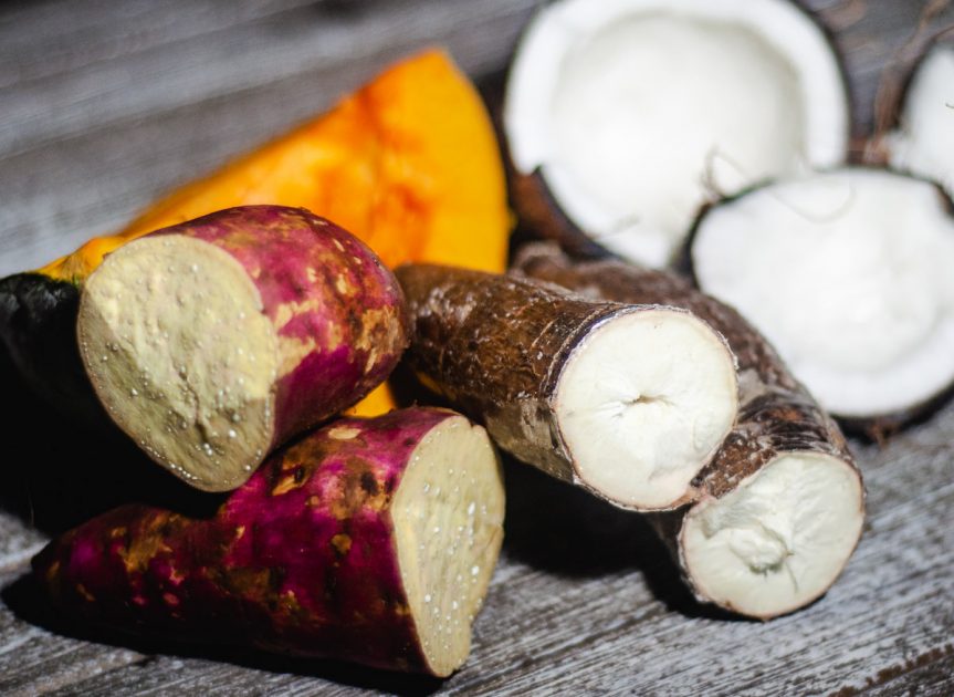Cassava Pone fresh ingredients: cut yam, cut cassava root, dried coconut, slice of pumpkin