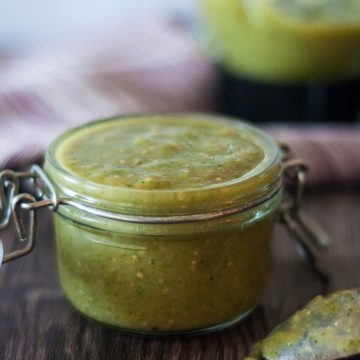 A small jar of roasted tomatillo salsa